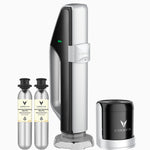 Coravin wine preservation system with a stylish handle, two CO2 cartridges, and a black base unit.