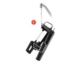 A black kitchen tool positioned under a faucet, with a number "1" indicating a step in a process.