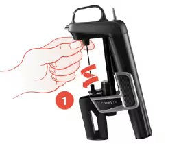 Coravin wine opener with a hand demonstrating how to twist the lever; step 1 highlighted.