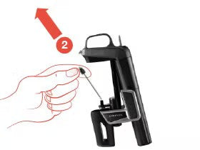 User hand pulling a lever on a black tool with a clamp, part of a step-by-step instruction for usage.